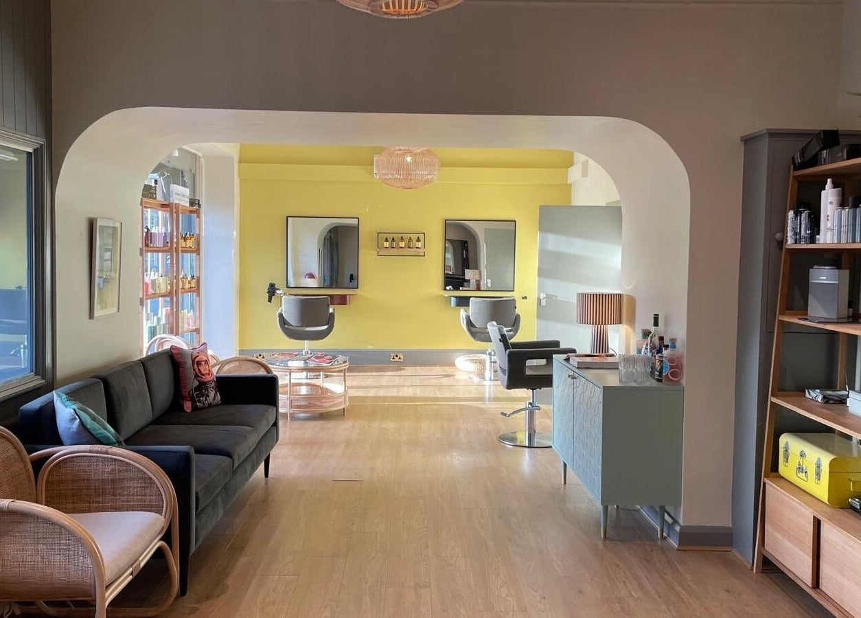 Interior view of The French Reception, Harrogate, England, GB; stylish seating and mirrors.