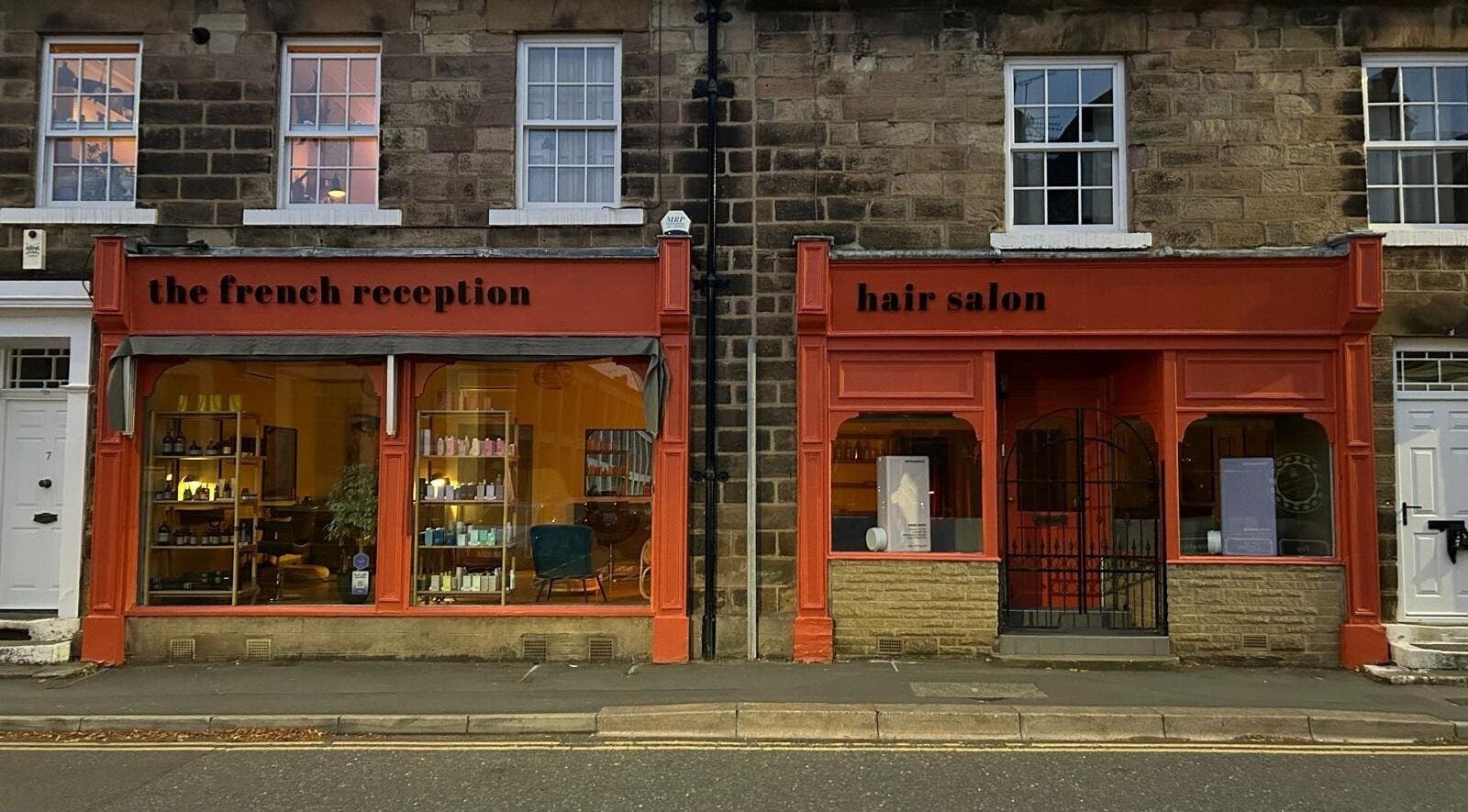 The French Reception hair salon exterior in Harrogate, England, GB showcasing stylish beauty product displays.