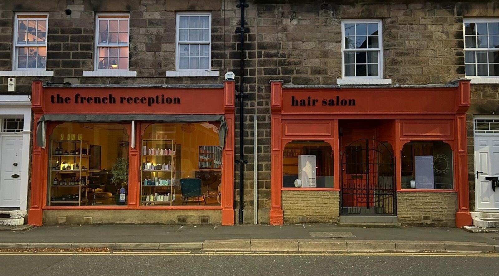 The French Reception hair salon exterior in Harrogate, England, GB showcasing stylish beauty product displays.