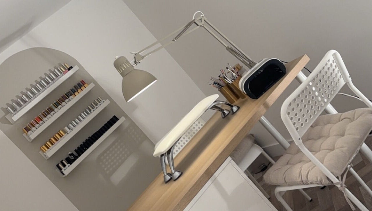 Modern nail station with polish racks at Get Glam By Alix Bulloch in Edinburgh, Scotland, GB.