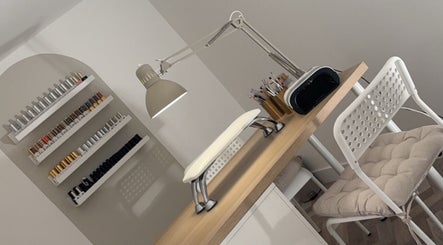Modern nail station with polish racks at Get Glam By Alix Bulloch in Edinburgh, Scotland, GB.