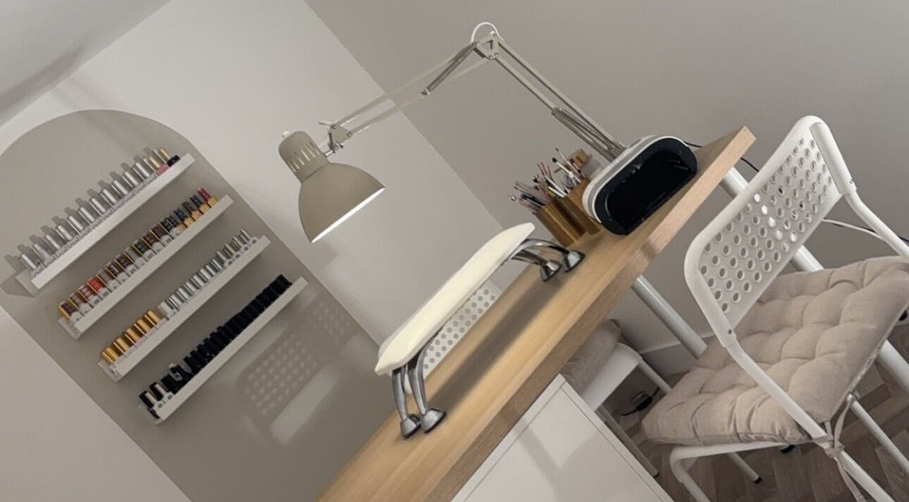 Modern nail station with polish racks at Get Glam By Alix Bulloch in Edinburgh, Scotland, GB.