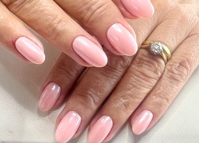 Elegant manicured pink nails at Cussans Nails & Beauty, Chichester, England, GB.
