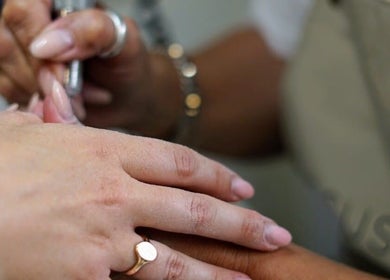 Nail technician at Cussans Nails & Beauty in Chichester, England, GB, crafting elegant nails.