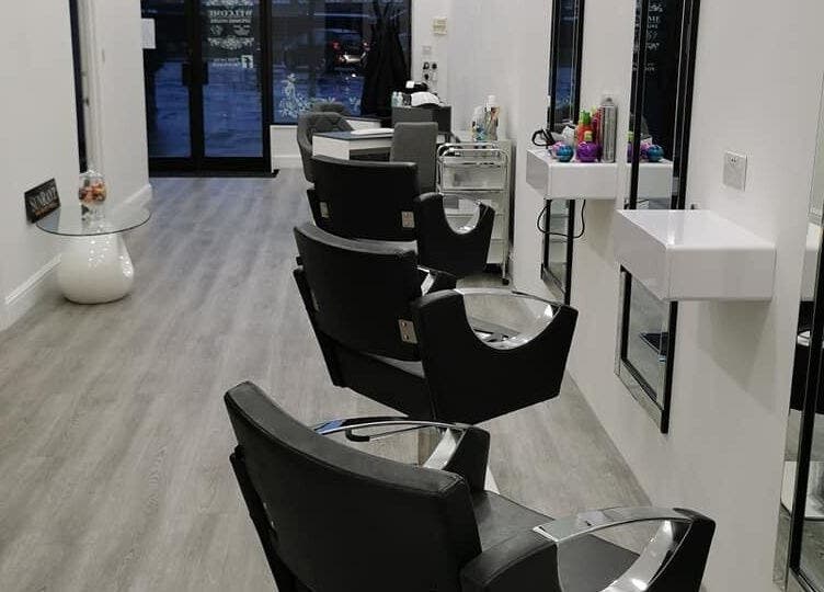 Modern salon chairs at Sunrayz Hair & Beauty, Hornchurch, England, GB, showcasing a sleek and stylish design.
