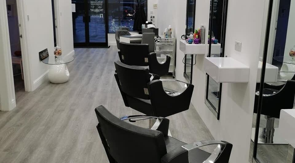 Modern salon chairs at Sunrayz Hair & Beauty, Hornchurch, England, GB, showcasing a sleek and stylish design.