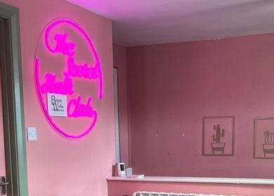 Pink neon sign at Jess Porter Pro Makeup Artist Hinckley, England, GB. Elegant decor enhancing the beauty venue.