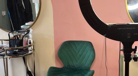 Jess Porter Pro Makeup Artist studio in Hinckley, England, GB with glam chair and mirror setup.