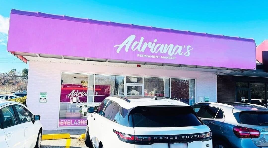 Adriana's Permanent Makeup II in Salem, New Hampshire, features a vibrant pink storefront and parking area.