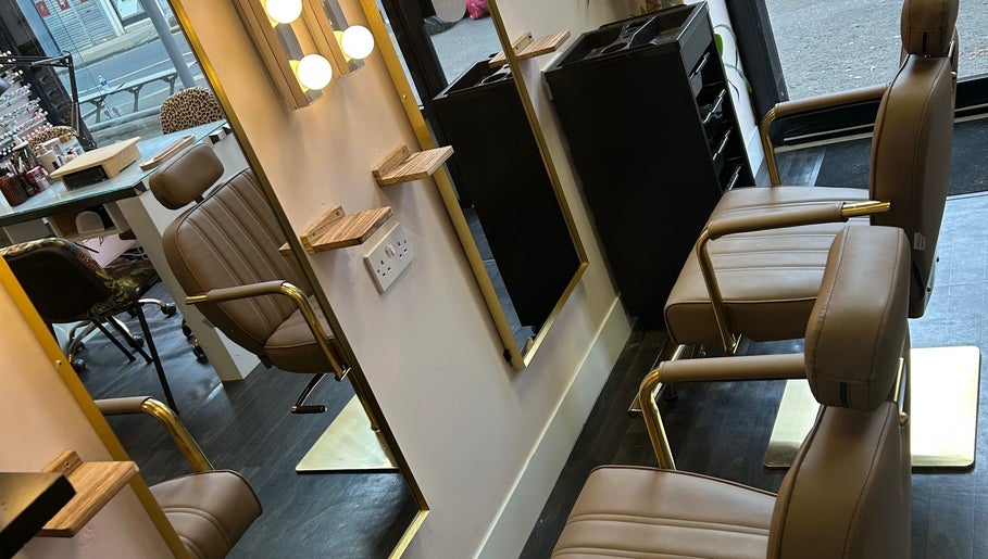 Luxurious beauty station at The Glambar, Glasgow, Scotland, GB, featuring elegant chairs and mirrors.