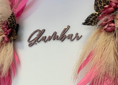 Elegant floral decor at The Glambar in Glasgow, Scotland, GB featuring vibrant pinks and neutral tones.