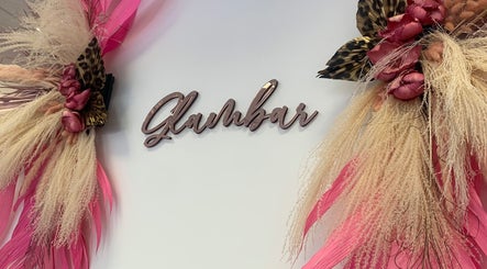 Elegant floral decor at The Glambar in Glasgow, Scotland, GB featuring vibrant pinks and neutral tones.