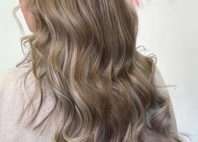 Elegant wavy hairstyle at The Glambar, Glasgow, Scotland, GB, showcasing professional hair design.