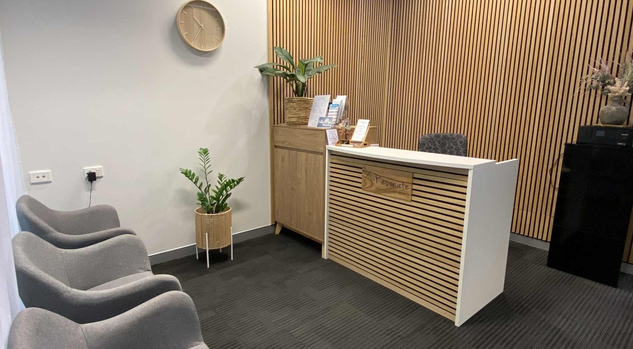 Reception area at Resonate Massage and Wellbeing, Holland Park, Queensland, AU with modern decor.
