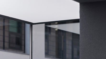 Sleek glass architecture detail at LEKKER Gangnam, seoul, seoul, KR, reflecting contemporary design.