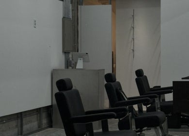 Modern salon chairs at LEKKER Gangnam, located in Seoul, Seoul, KR, highlighting a minimalist decor.