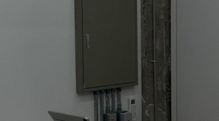 Modern office corner at LEKKER Gangnam, Seoul, KR with minimalist decor and sleek surfaces.
