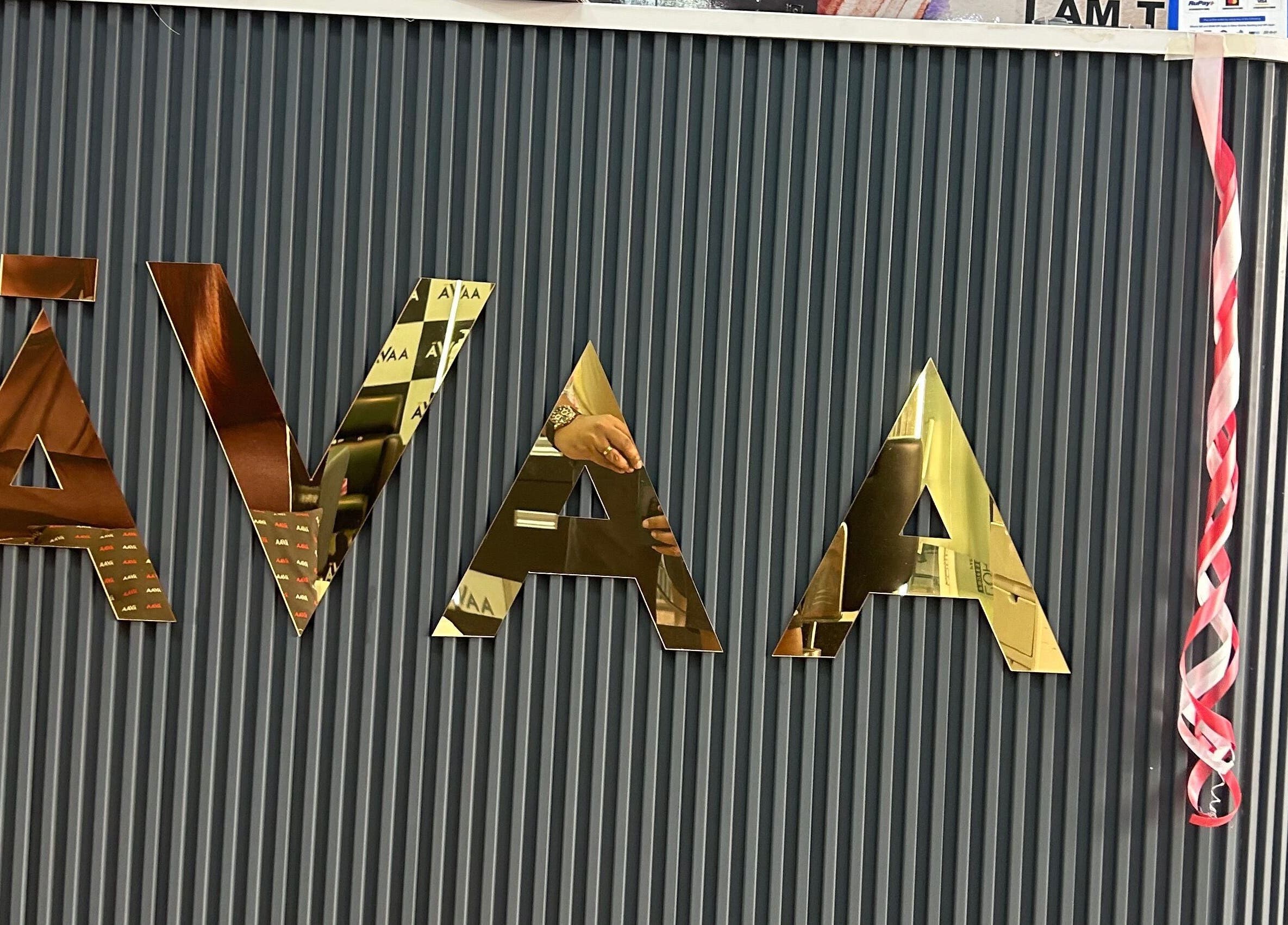 Avaa_Kandivali logo on elegant front desk in Mumbai, Maharashtra, IN.