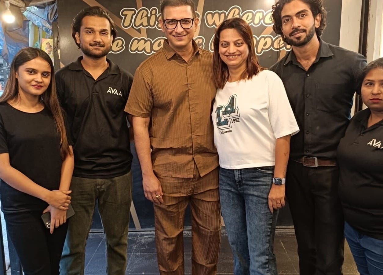 Team members of Avaa_Kandivali smiling together at the venue in Mumbai, Maharashtra, IN.