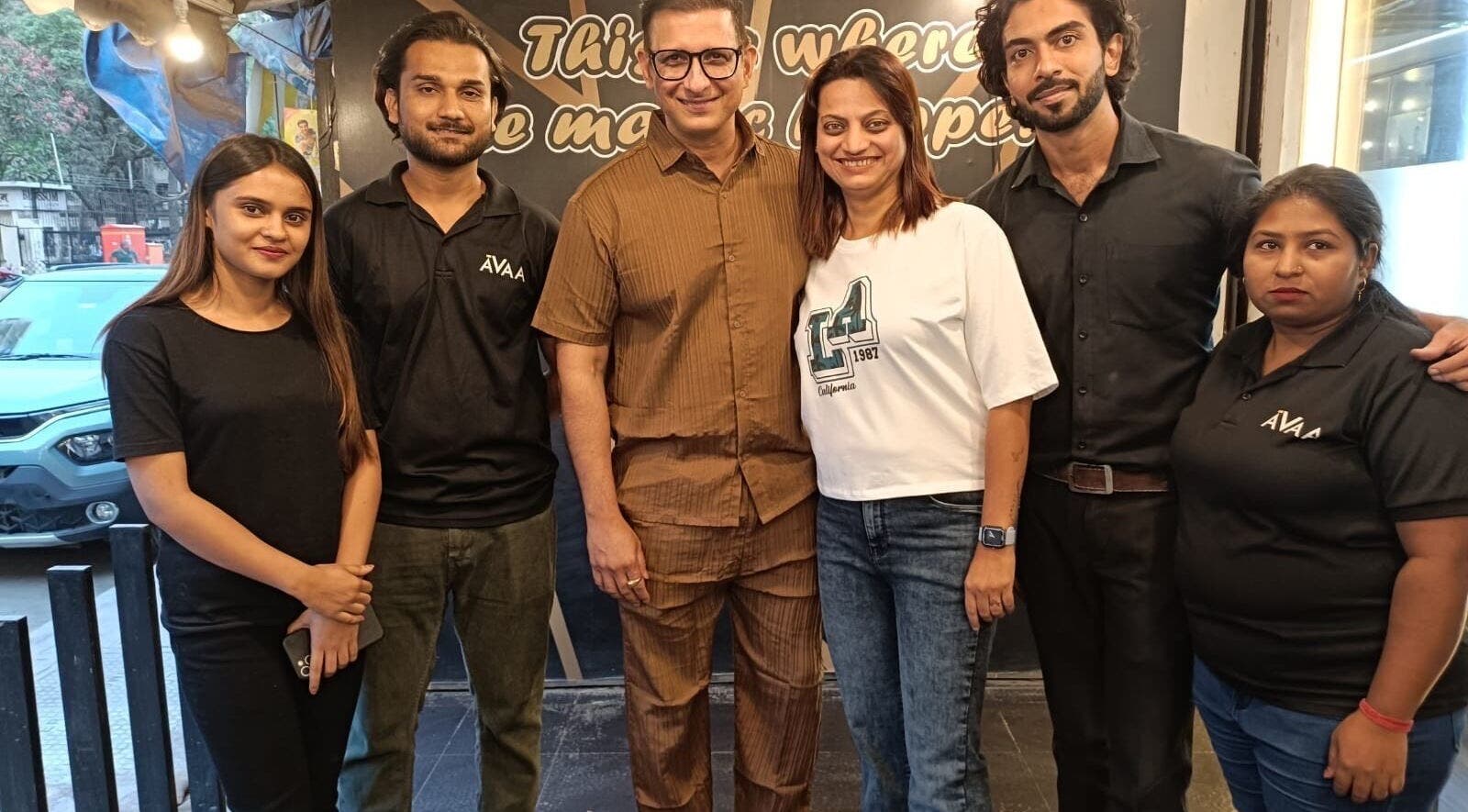 Team members of Avaa_Kandivali smiling together at the venue in Mumbai, Maharashtra, IN.