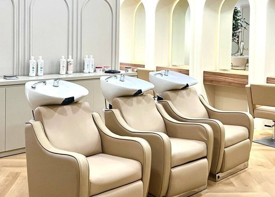 Luxurious hair wash stations at La Beauté, Dubai, AE, featuring sleek contemporary design and comfort.