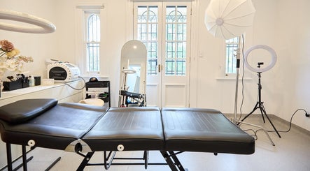 Modern treatment room at Angelina Samko, Bondi Junction, New South Wales, AU, featuring sleek equipment and decor.