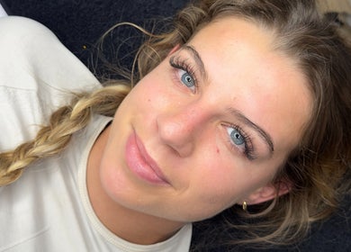 Woman with enhanced lashes at Gosh Beauty (Gosh Nails 2nd Branch), Stellenbosch, Western Cape, ZA.