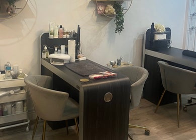 Modern nail salon at The Beauty Stop, Mansfield, England, GB with sleek decor and beauty products.