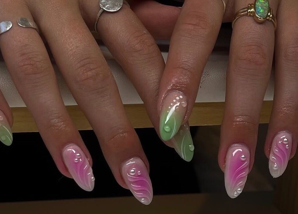 Colorful nail art at Amour Nails by Baya, Port Macquarie, New South Wales, AU with pink and green designs.
