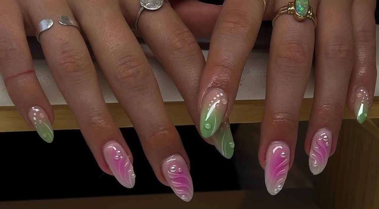 Colorful nail art at Amour Nails by Baya, Port Macquarie, New South Wales, AU with pink and green designs.