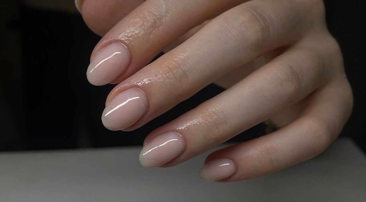 Stylish glossy nude nails at Amour Nails by Baya, Port Macquarie, New South Wales, AU.