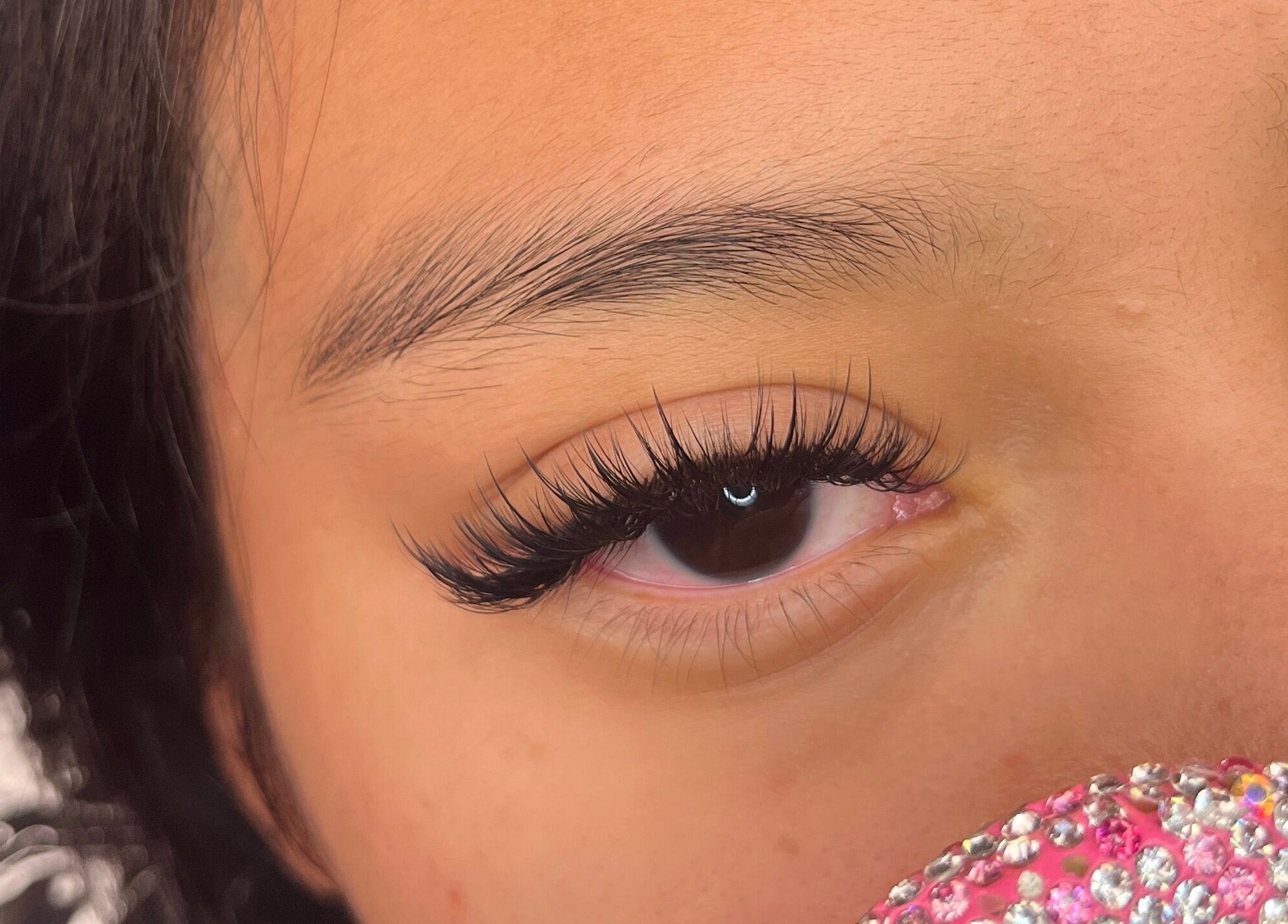 Close-up of eyelash extensions at Cypress Lash Studio, Cypress, Texas, US, showcasing intricate detail.