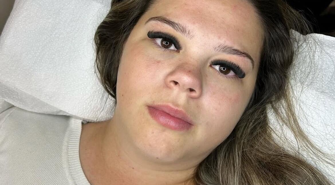 Close-up of a woman with eyelash extensions at Lashes By Becky in Caernarfon, Wales, GB.