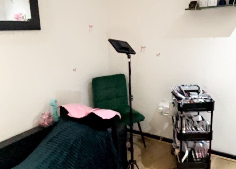 Beauty treatment room at Created By Leenah, Purfleet, England, GB with a cozy setup and organized supplies.