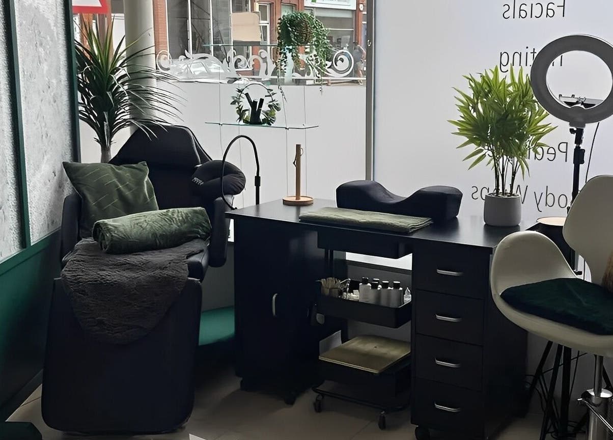 Relaxing spa corner at Morgan Brown Hair And Beauty Ltd, Weymouth, England, featuring plush seating and decor.