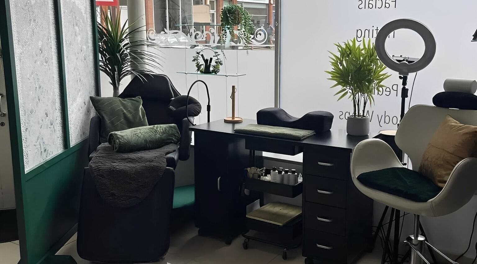 Relaxing spa corner at Morgan Brown Hair And Beauty Ltd, Weymouth, England, featuring plush seating and decor.