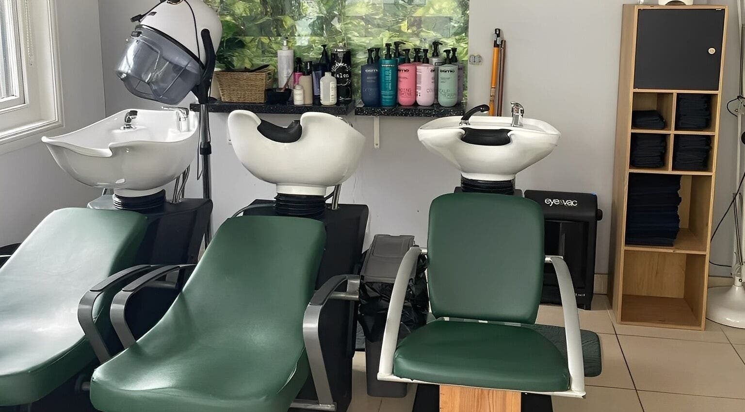 Elegant wash stations at Morgan Brown Hair And Beauty Ltd, Weymouth, England, GB. Comfort meets style.