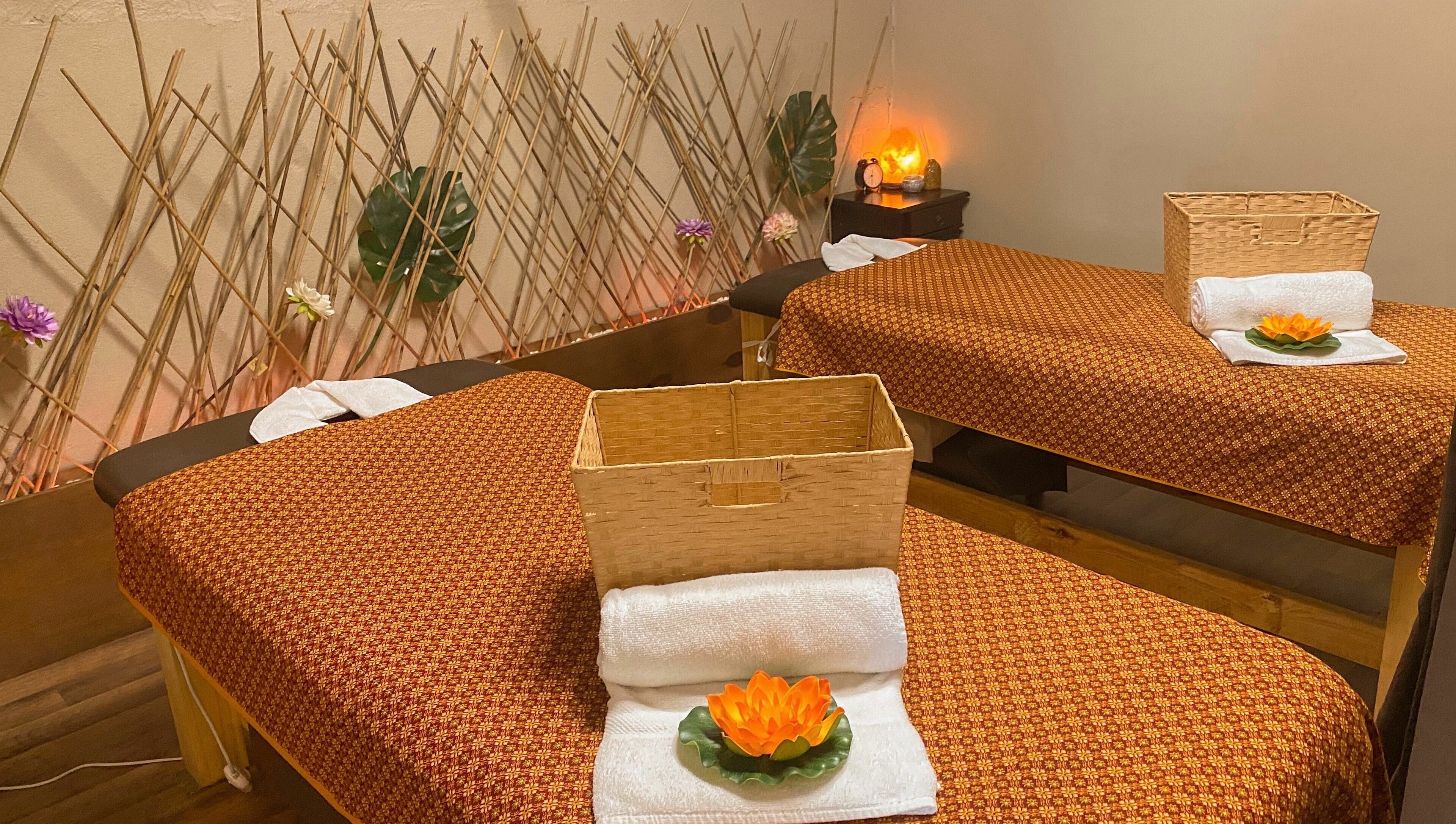 Tranquil massage room at Forget Me Not Thai Massage, Melbourne, Victoria, AU, with bamboo accents and lotus decor.