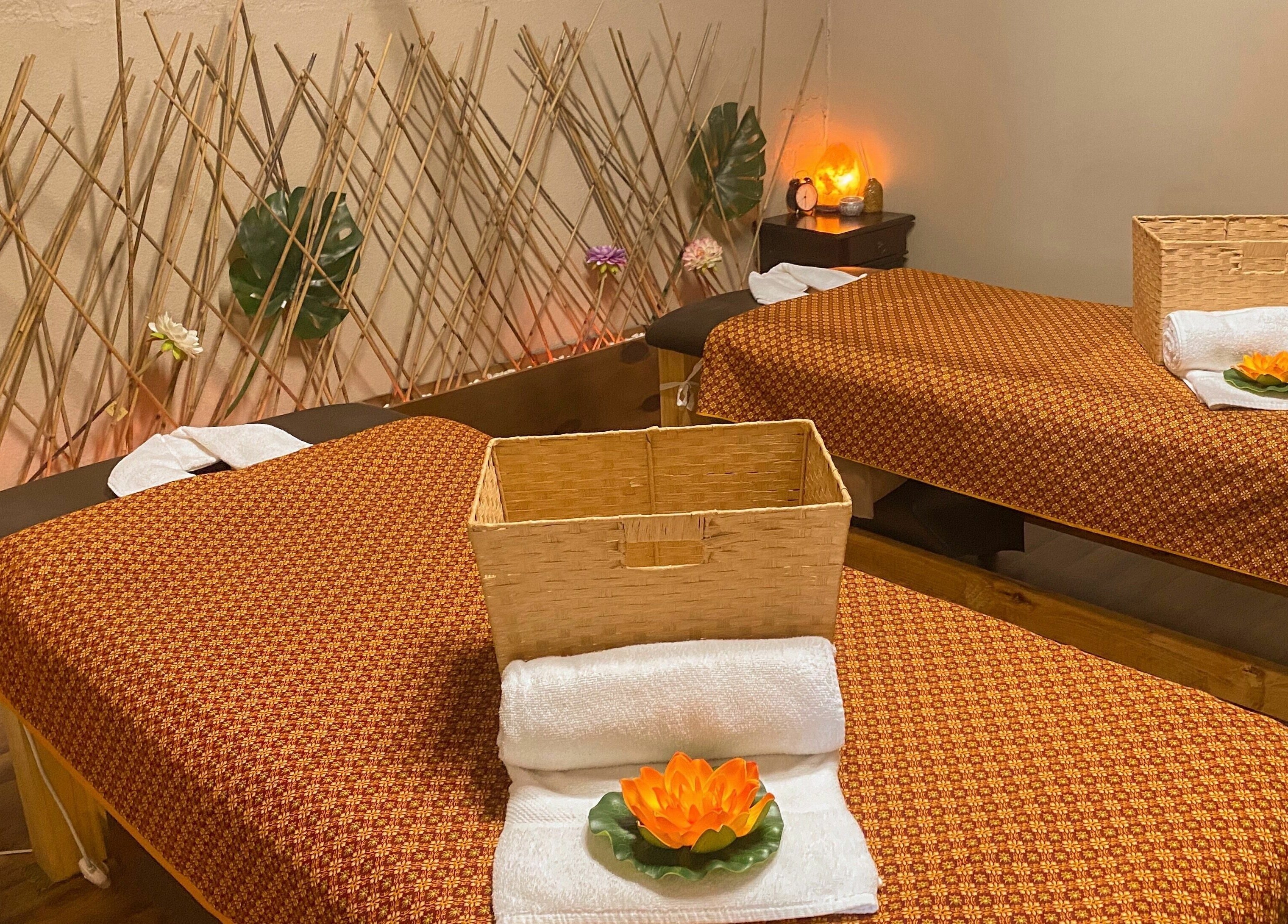 Tranquil massage room at Forget Me Not Thai Massage, Melbourne, Victoria, AU, with bamboo accents and lotus decor.