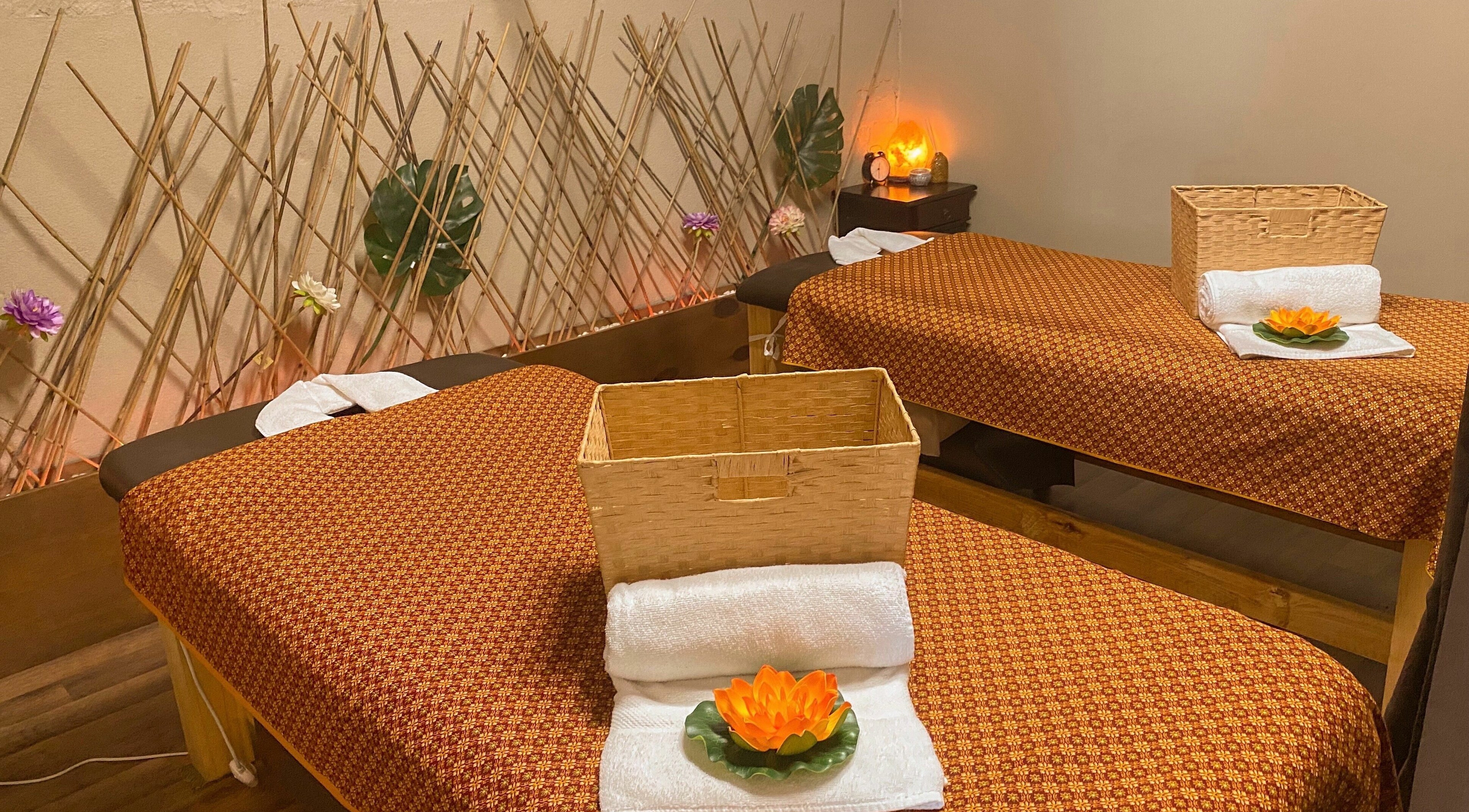Tranquil massage room at Forget Me Not Thai Massage, Melbourne, Victoria, AU, with bamboo accents and lotus decor.