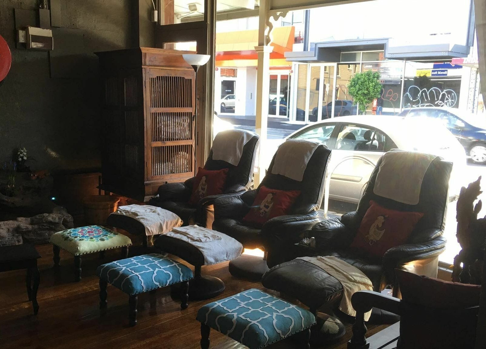 Relaxing chairs in Forget Me Not Thai Massage, Melbourne, Victoria, AU create a cozy spa ambiance with natural light.
