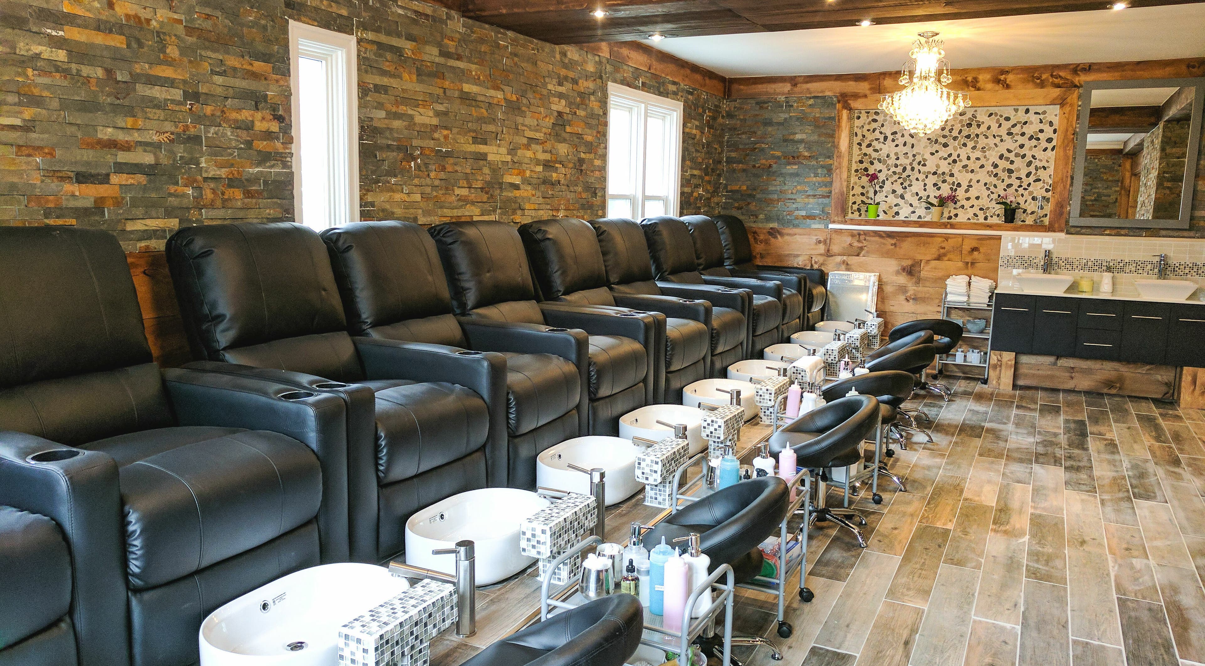 Luxurious pedicure chairs at High Definition Spa in Ottawa, Ontario, CA, featuring elegant decor and serene ambiance.