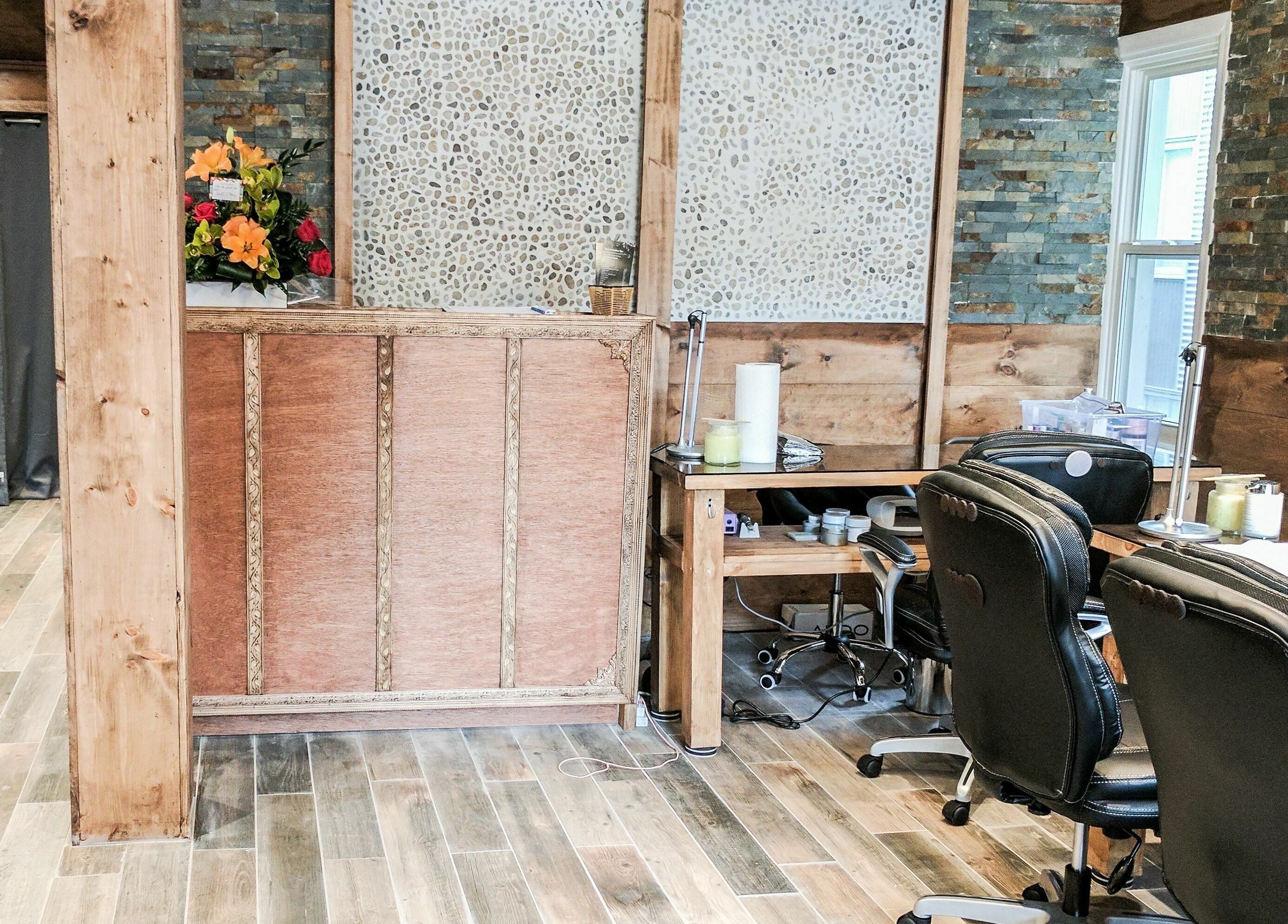 Stylish interior of High Definition Spa in Ottawa, Ontario, CA featuring rustic wood and stone decor.