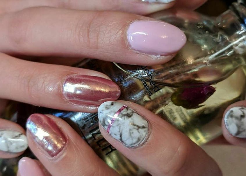 Stylish marble and metallic nails at High Definition Spa, Ottawa, Ontario, CA. Luxurious nail care service.