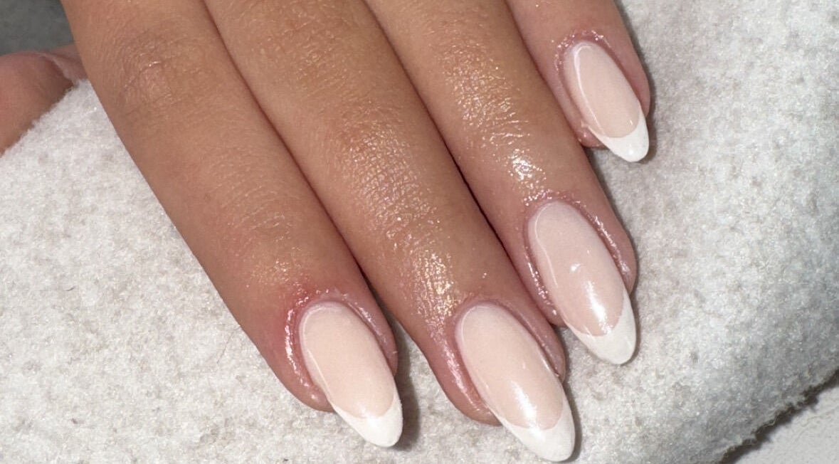 Beautiful French tip nails at Salon 33 by Ellie, Barrowford, England, GB. Exquisite nail art on display.