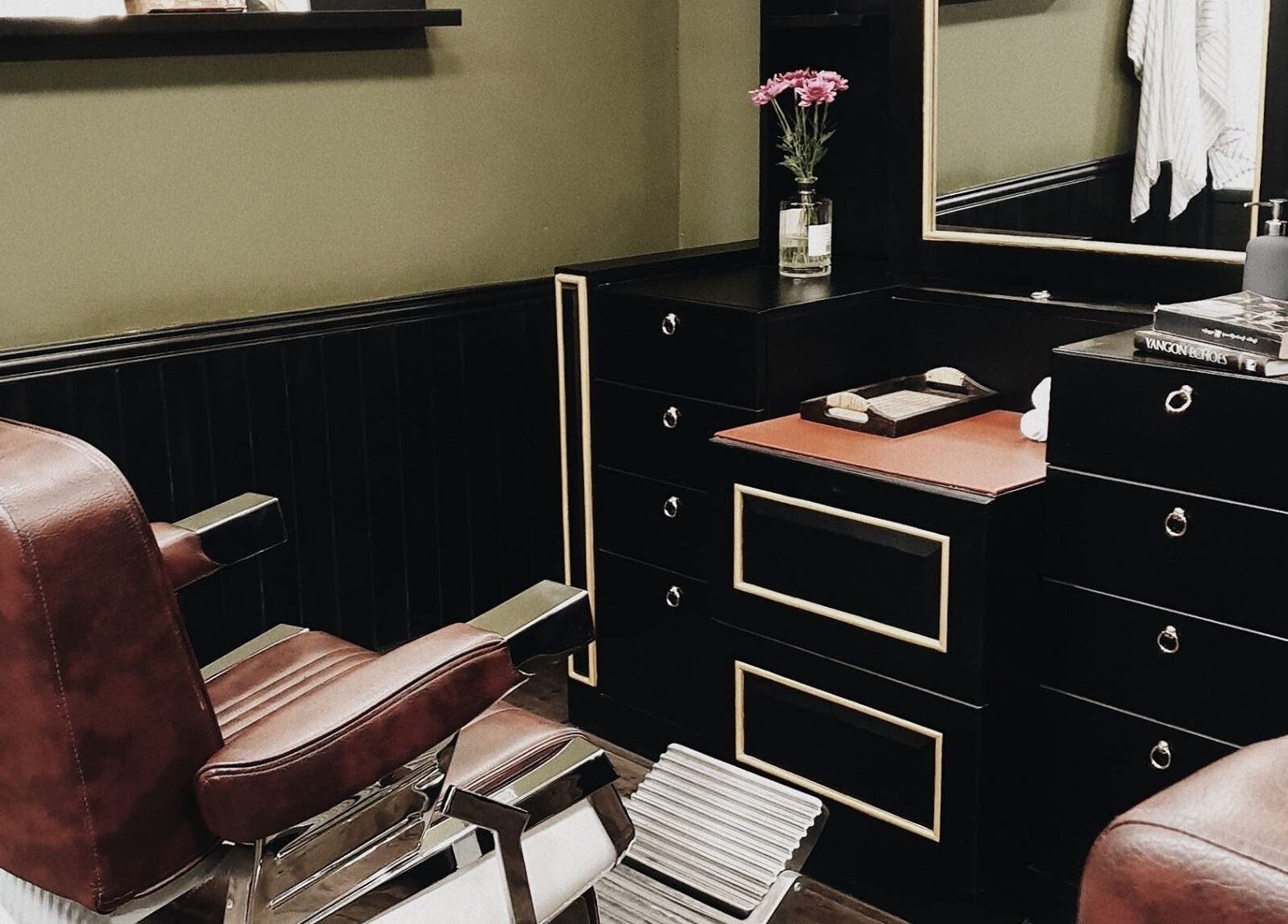 Classic barber chair and sleek vanity at Burman Bogalay Zay St, Yangon, Yangon Region, MM.