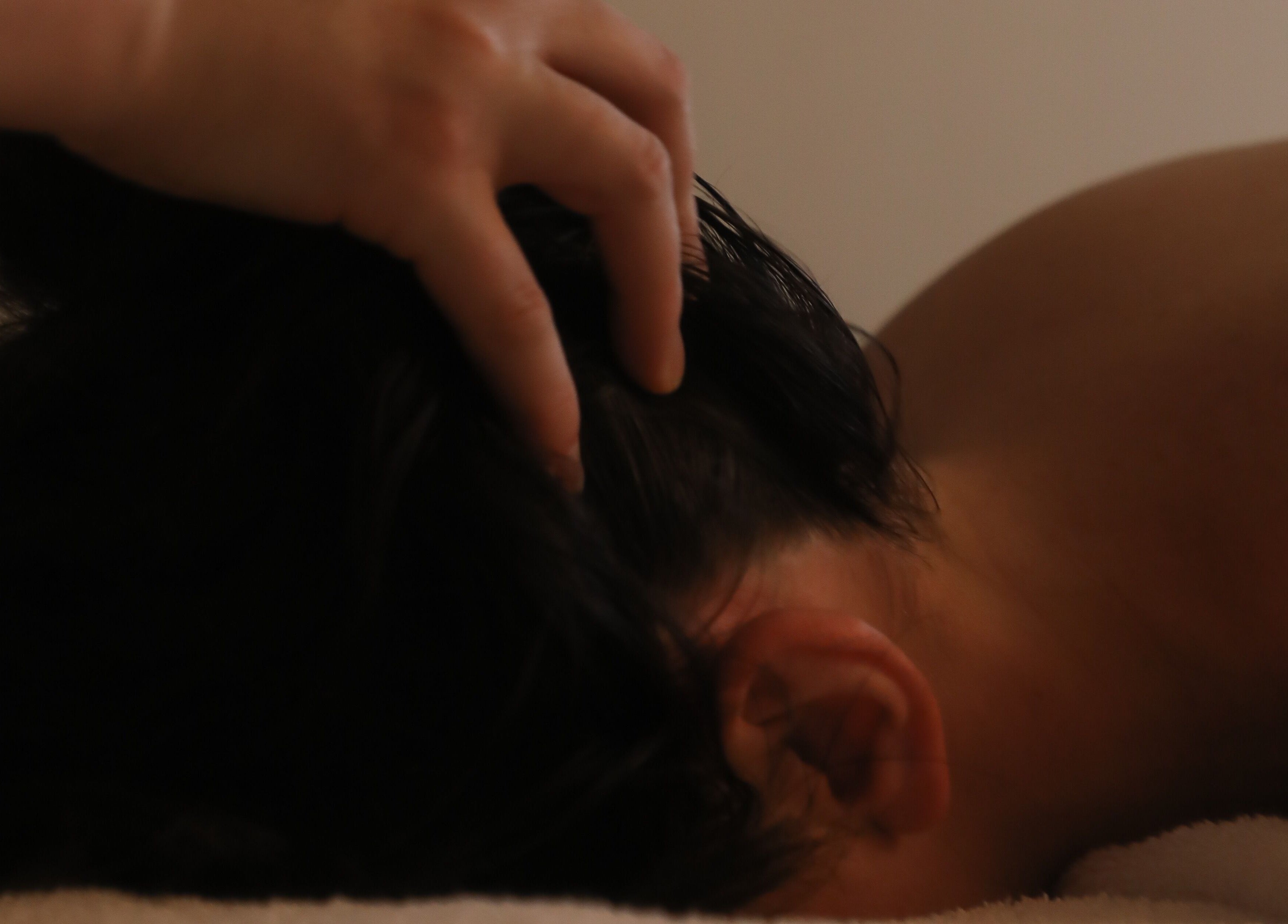 Relaxing head massage at Soften MELBOURNE, Prahran, Victoria, AU offering soothing wellness treatments.