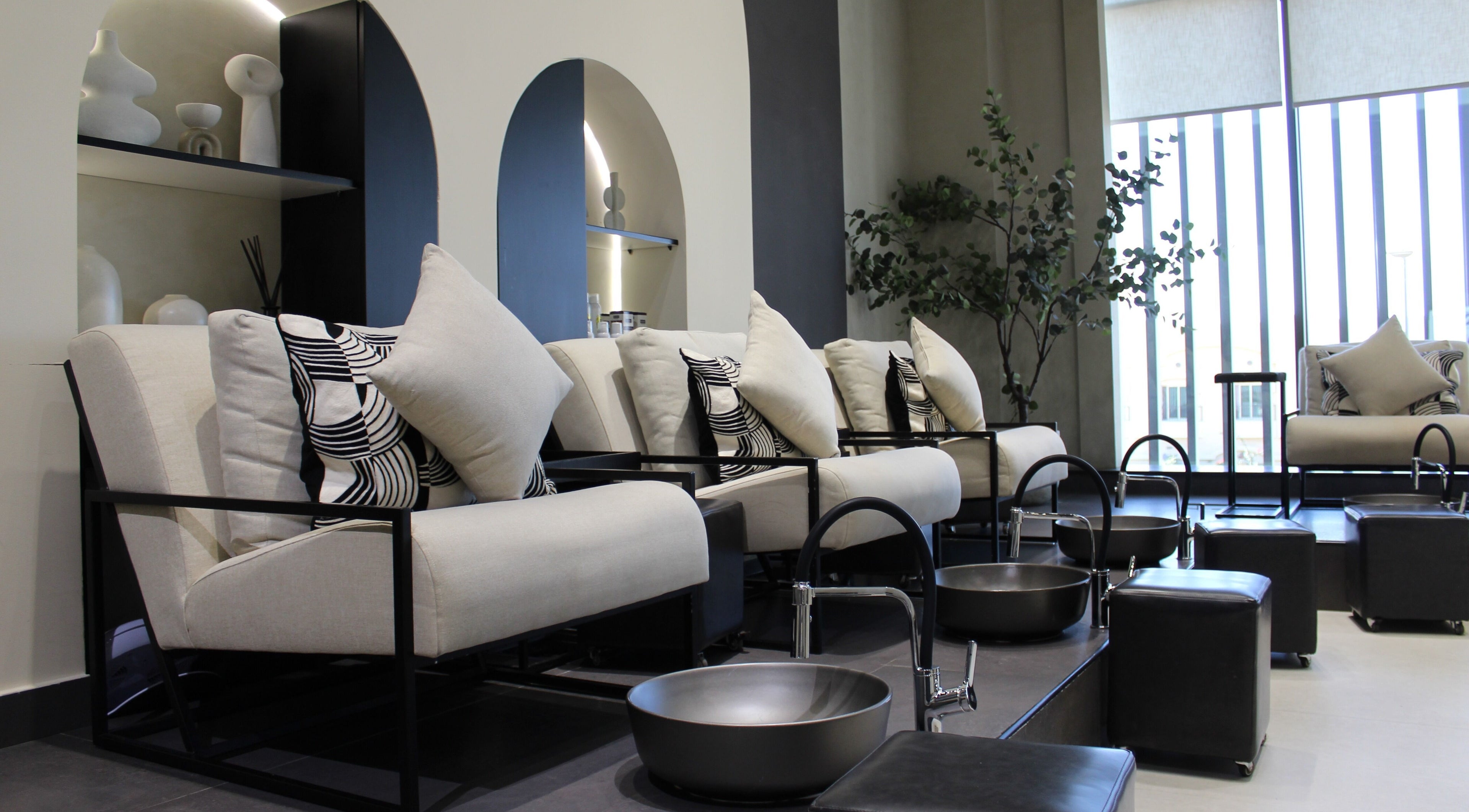Elegantly designed pedicure area at Nail Studio Ladies Beauty Salon in Dubai, Dubai, AE with modern decor.