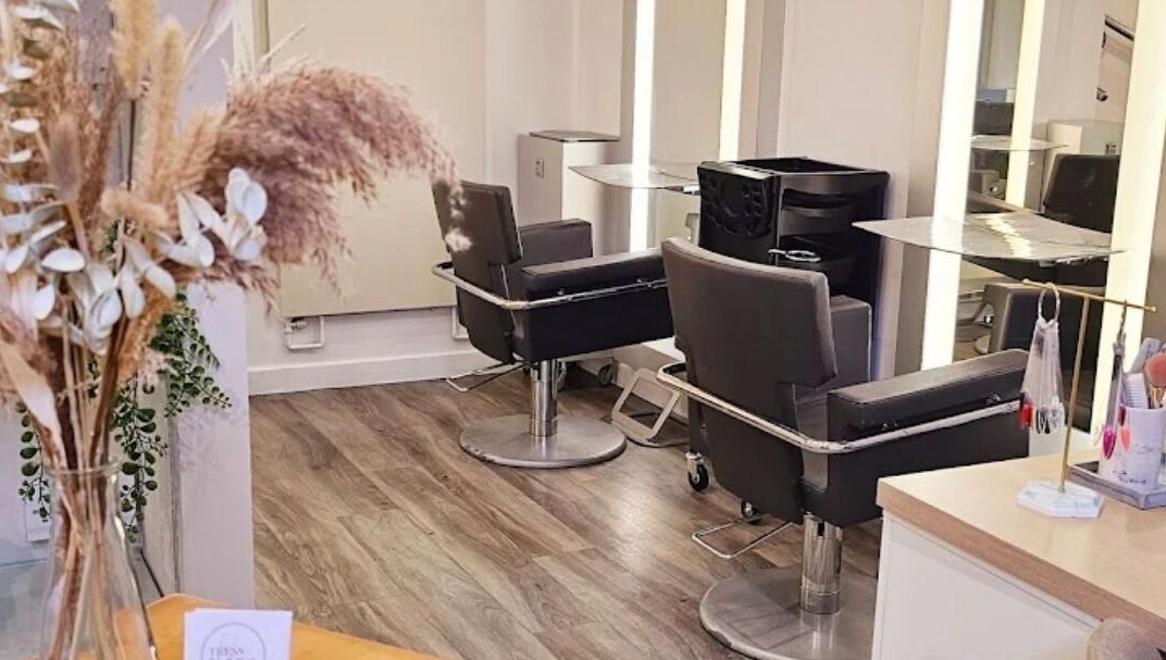 Cozy salon chairs at Tress & Bloom Ystradgynlais, Ystradgynlais, Wales, GB, offering a welcoming beauty space.