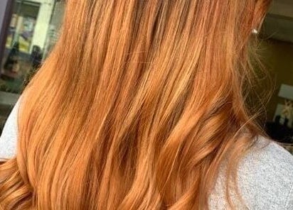 Lustrous copper hair styled with waves at Tress& Bloom Ystradgynlais, Ystradgynlais, Wales, GB.